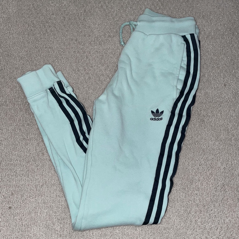 Mint green and black adidas sweatpants
